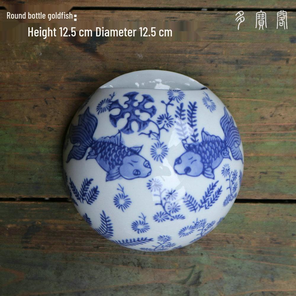 Hand-Painted Blue and White Ceramic Wall Vase with Floral and Bird Design