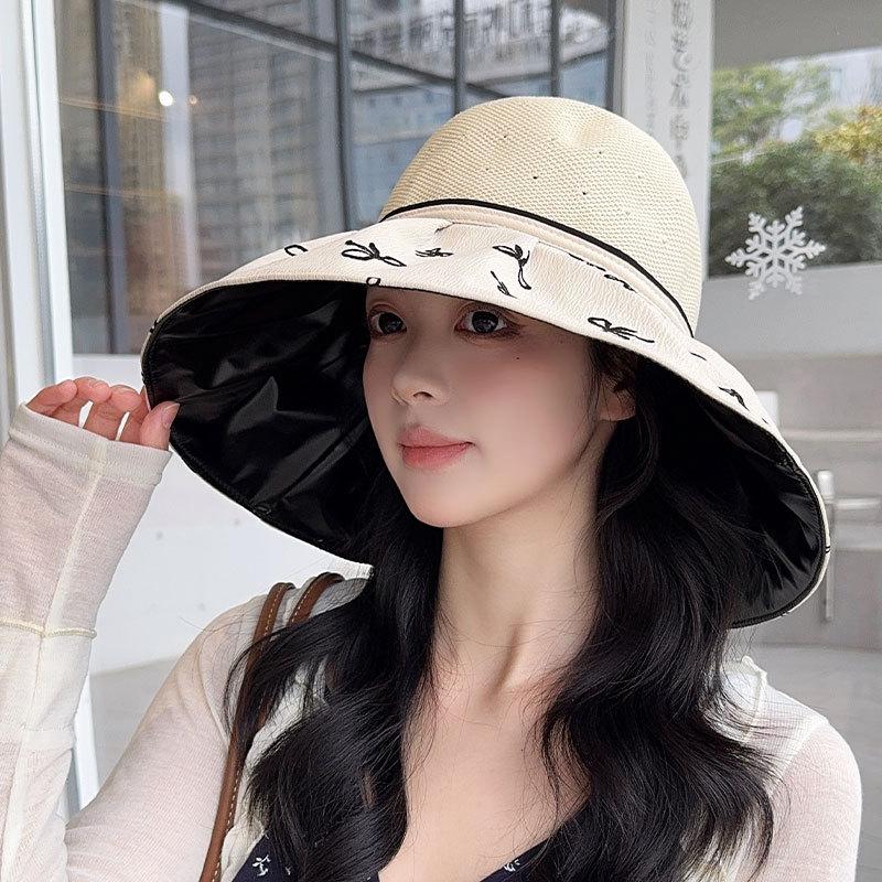 Hat women's spring and summer new bow knitted empty top hat vinyl sunscreen beach sunshade printing folding sun hat