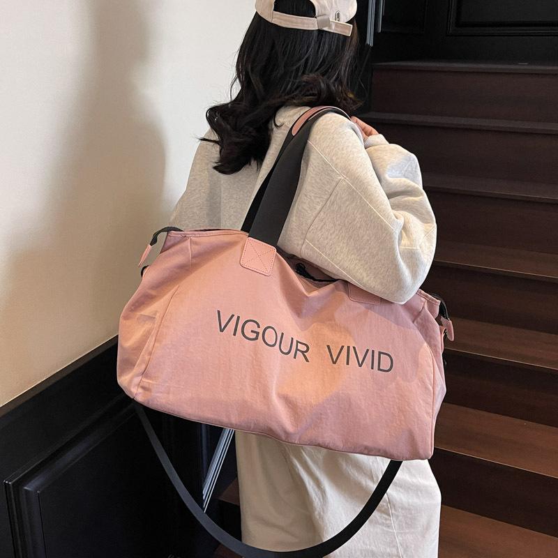 Business trip short trip bag women's lightweight solid color fitness bag fashion shoulder sports bag men's portable storage duffel bag