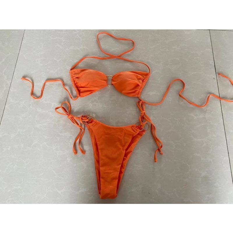 

Женский двухсекционный купальник-бикини с оранжевым металлическим кольцом, на завязках на шее и по бокам S оранжевый