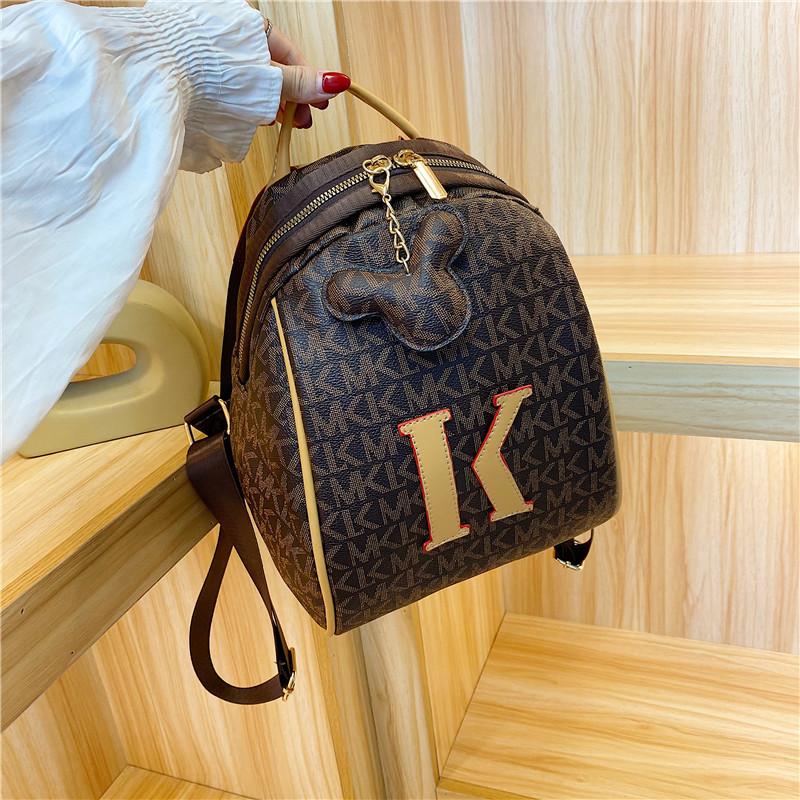 Стильный рюкзак с текстурой в стиле легкой роскоши, модный, новый нишевый тренд с принтом, удобная студенческая сумка