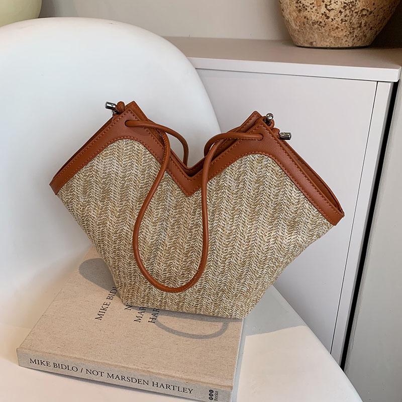 Spring and Summer Niche Straw Woven Bag Women's New Handbag Tote Bucket Bag Versatile Shoulder Armpit Bag