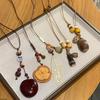 Collana Bohemian in Resina con Ghianda e Ciondolo Geometrico per Donna Moda Estiva