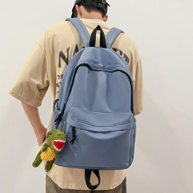 School bag college students solid color simple junior high school students Korean version daily large-capacity street backpack