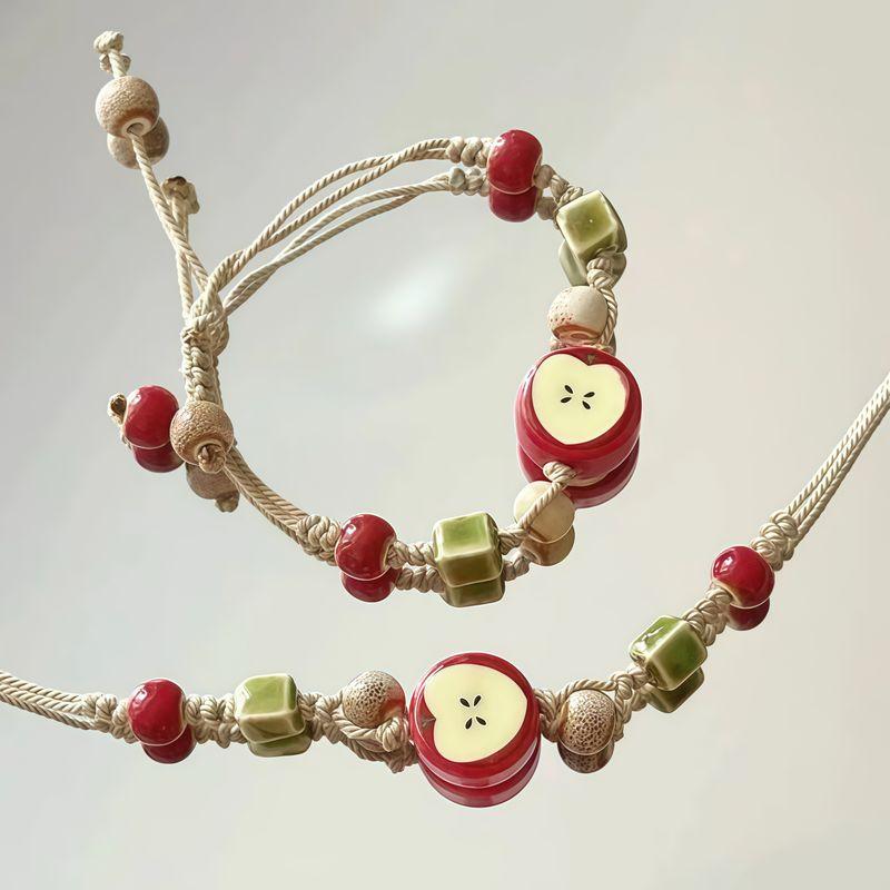 

Керамический браслет-плетенка с бусинами в виде яблока, женский, дизайн для особых случаев, изысканный и универсальный, милый браслет, для подруг, для пары, украшение на руку Apple bracelet 2 Pack