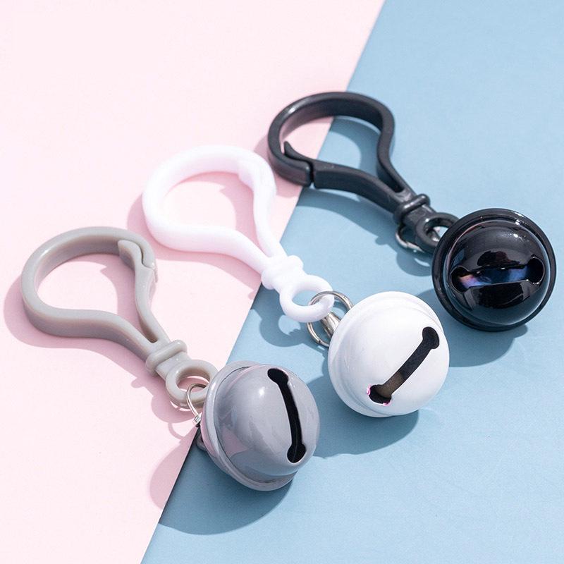 Bunter Plastikglocken-Schlüsselanhänger-Ornament - Niedliches und kreatives kleines Geschenkaccessoire.