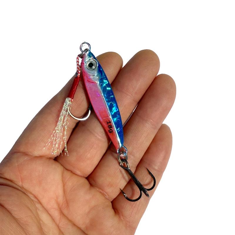 Luminous Blue Knife Iron Plate Lure with Double Hooks for Long Casts, Sea & Freshwater Fishing.