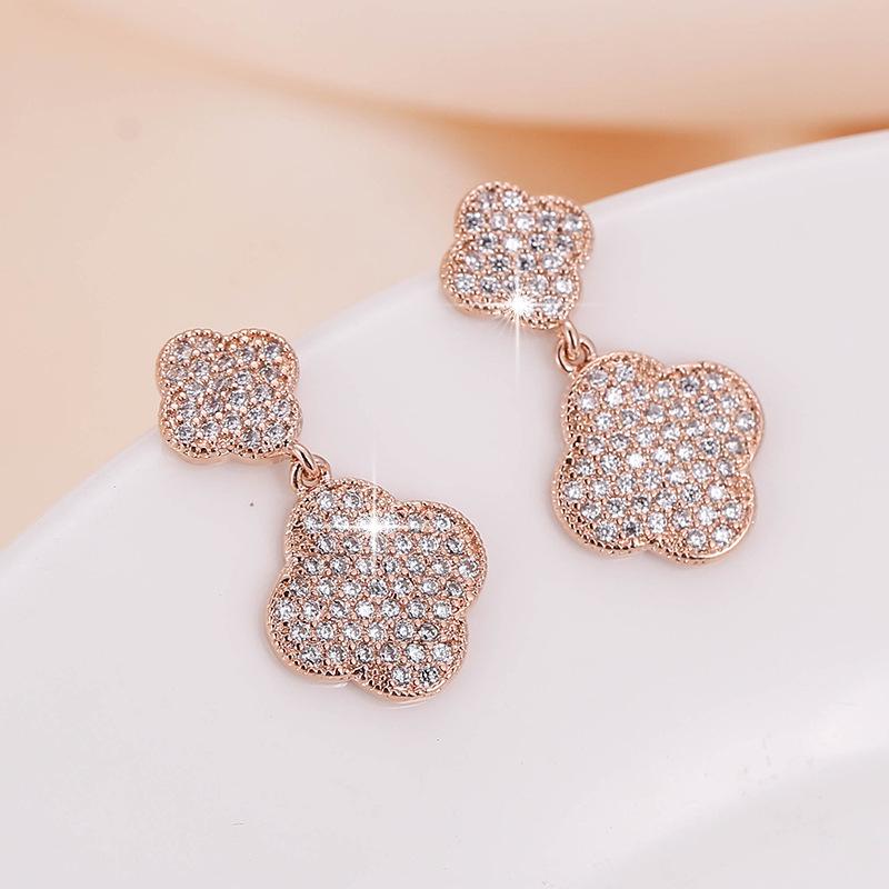 Geometric Petal Rhinestone Stud Earrings: Elegant Copper Earrings with Minimalist Design for Women