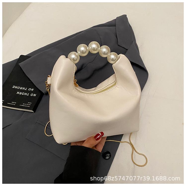 

Fashion niche design pearl handbag bag women s new high-end chain messenger bag small fresh dumpling bag белый