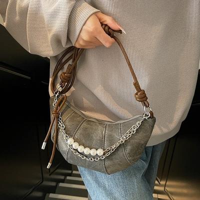 Beliebte Nischentasche Damen Frühling und Sommer neue Mode vielseitige Umhängetasche Schulter Knödeltasche Croissant-Tasche