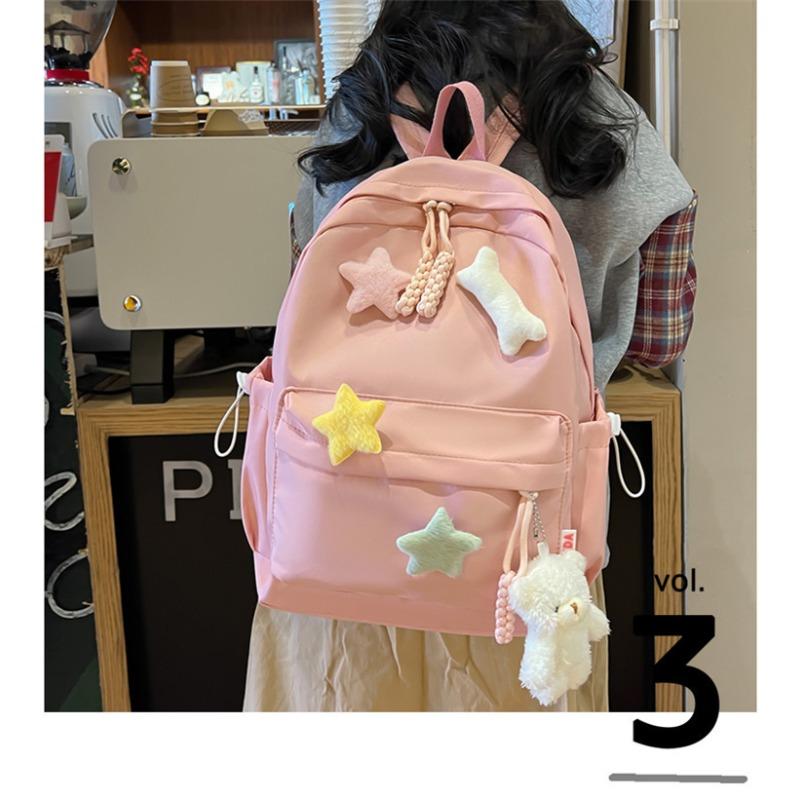 Koreanische Version der neuen süßen Schultasche Mädchen niedliche Sterne Mittelschüler gehen aus kleiner Rucksack große Kapazität Highschool-Rucksack