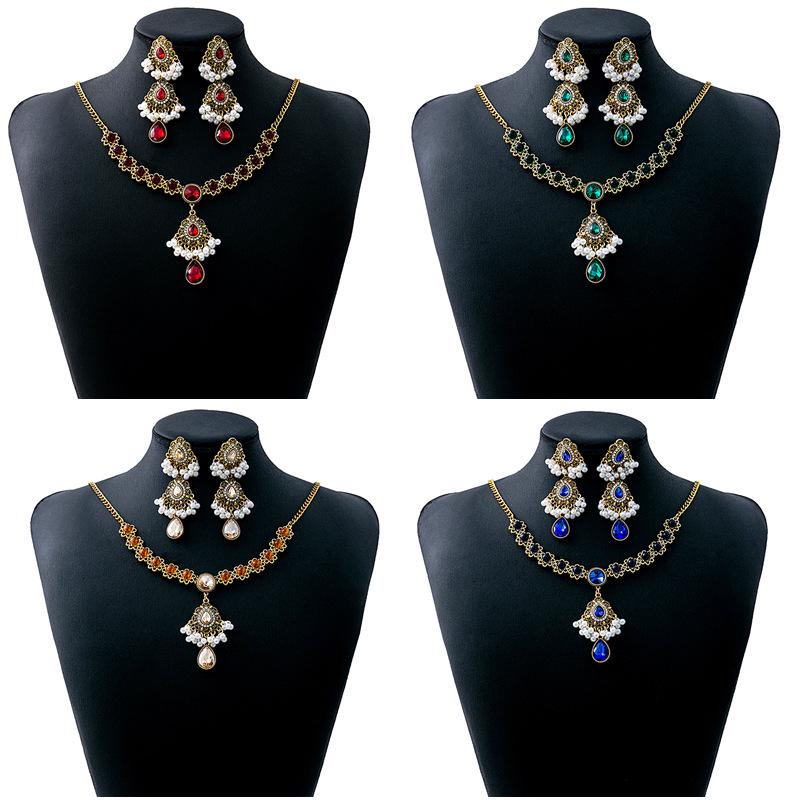 

Luxury Water Drop Jewelry Set: Retro Pearl Earrings & Zircon Necklace