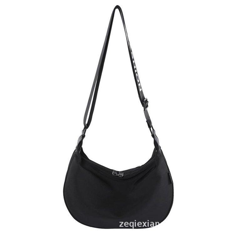 2025 new women's canvas bag dumpling bag versatile canvas bag large capacity class shoulder commuter bag
