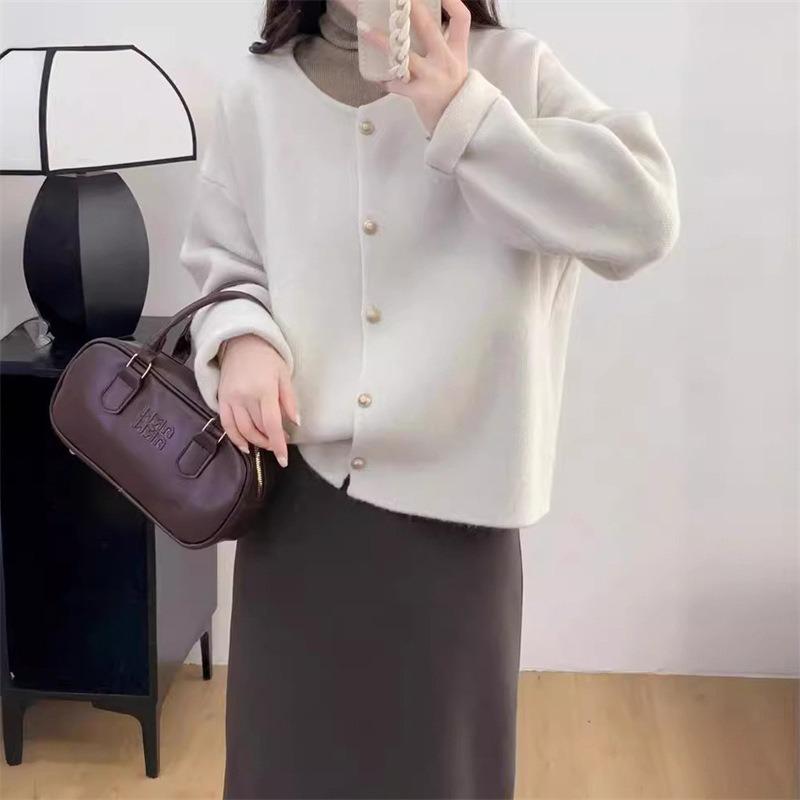 Autumn and winter new round neck solid color knitted cardigan loose lazy soft waxy sweater women's coat tide