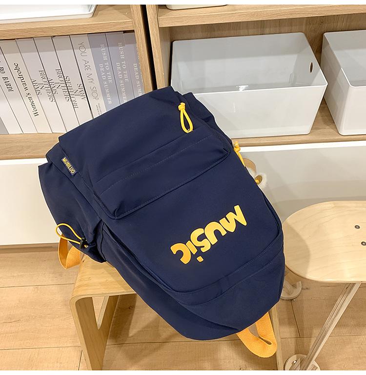 American High Street Large-Capacity Weight-Reducing Backpack for Middle School Boys and Girls