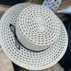 French bow flat top straw hat women's summer hollow breathable flat brim seaside beach vacation sun hat