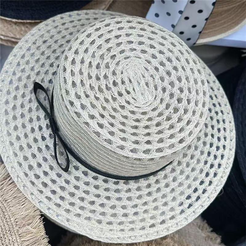 French bow flat top straw hat women's summer hollow breathable flat brim seaside beach vacation sun hat