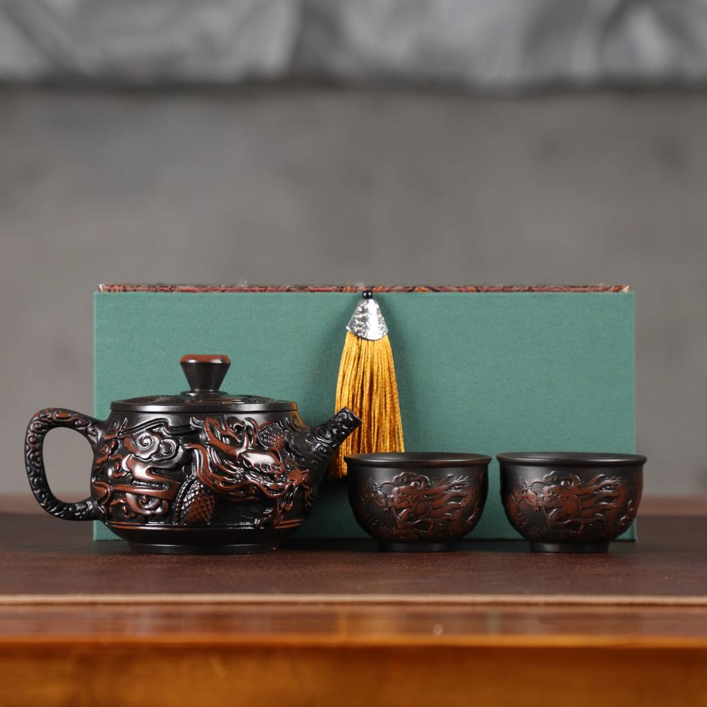 Teapot purple pottery material large capacity pure hand-carved retro relief desktop ornament household Chinese gift rotary pot