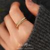 A Niche Sophisticated Knotted Double-layered Open-style Ring