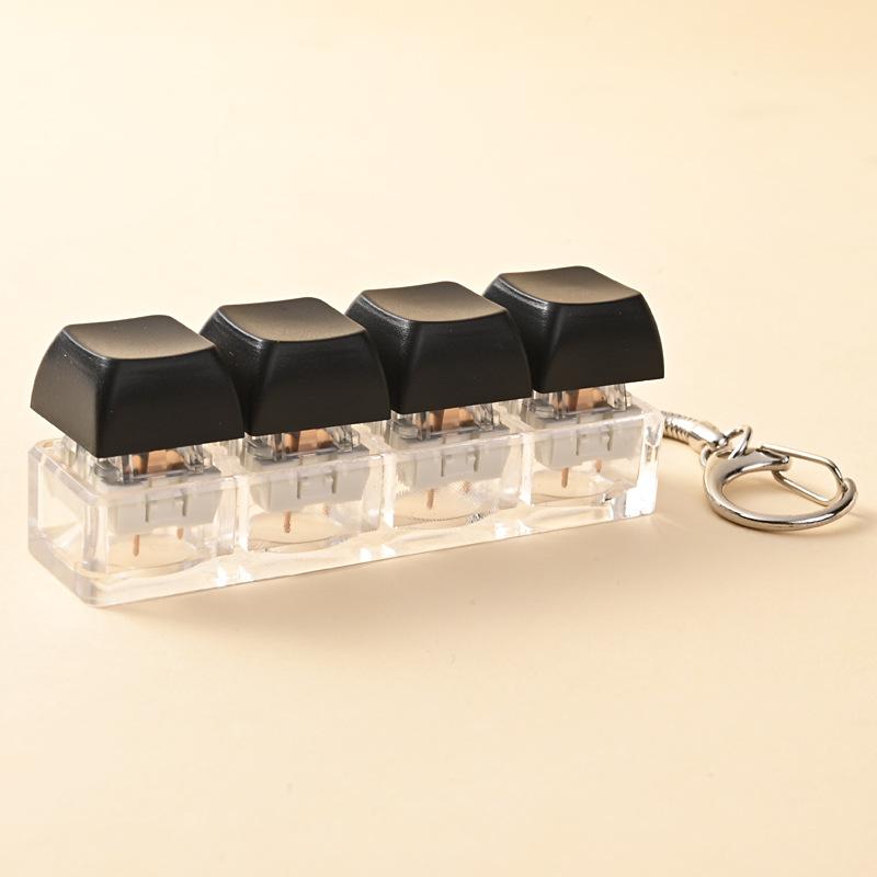 4 Tasten Tastenkappe zur Stressbewältigung für Erwachsene Fidget Spielzeug Schlüsselanhänger 4 Tasten Tastatur Fidget Gadgets Spielzeug DIY Tastatur Schlüsselanhänger Spielzeug