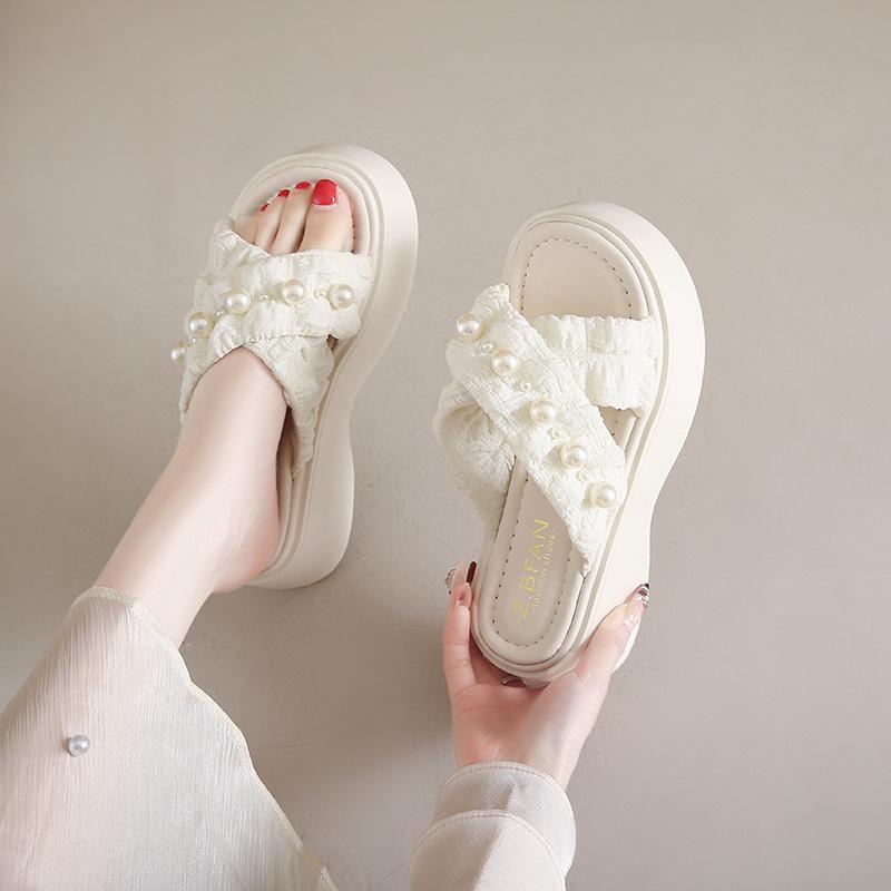 Women's heightening new one-word sandals thick-bottomed outer wear skirt French elegant outer wear pearl slippers 2025 summer