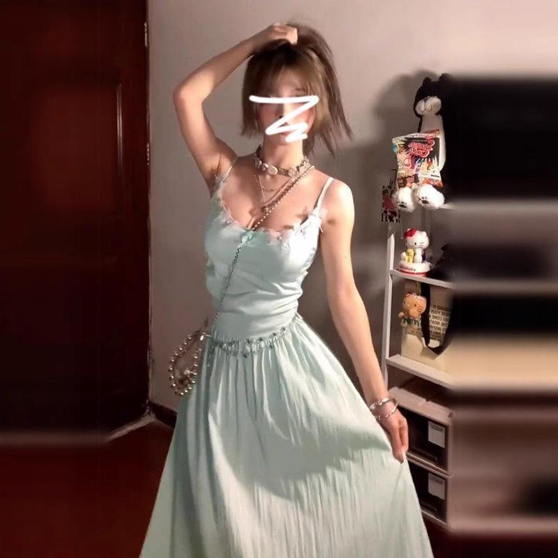Green backless suspender dress children's summer seaside vacation French high-end temperament waist a-word long dress