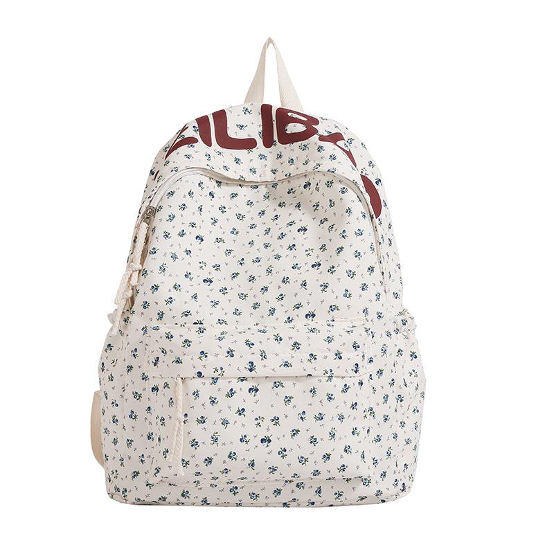Schoolbag schoolbag female junior high school student high school student campus large capacity double shoulder floral letter ins style high niche