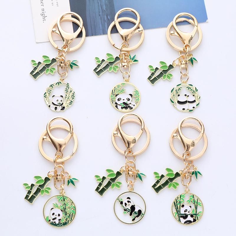 Quirky Cartoon Panda Alloy Keychain Pendant with Cute Bamboo Leaf Design - Earphone Case & Bag Decoration