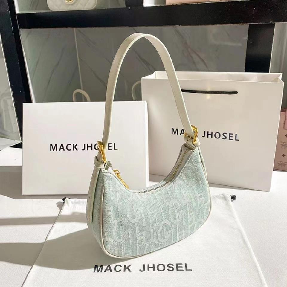 Hong Kong MackJhosel PU Niche Vintage Canvas Baguette Armpit Bag Women's New Shoulder Bag for Autumn and Summer