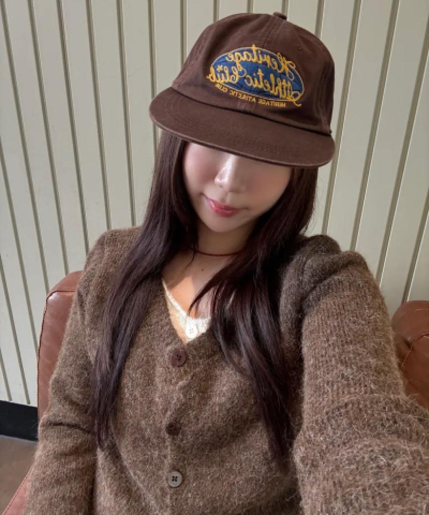 Yunibeoseugameonteu Universe Sign Long Bill Washed Cap_Brown