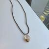 2025 New Style White Crystal Pendant Necklace for Women - Braided Rope Clavicle Chain, High-End Chinese Sweater Accessory.