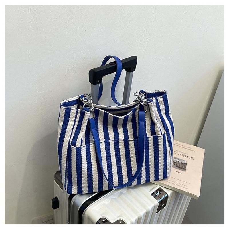 

Large capacity contrasting striped tote bag retro literary and artistic portable canvas shoulder bag casual commuter bag синий