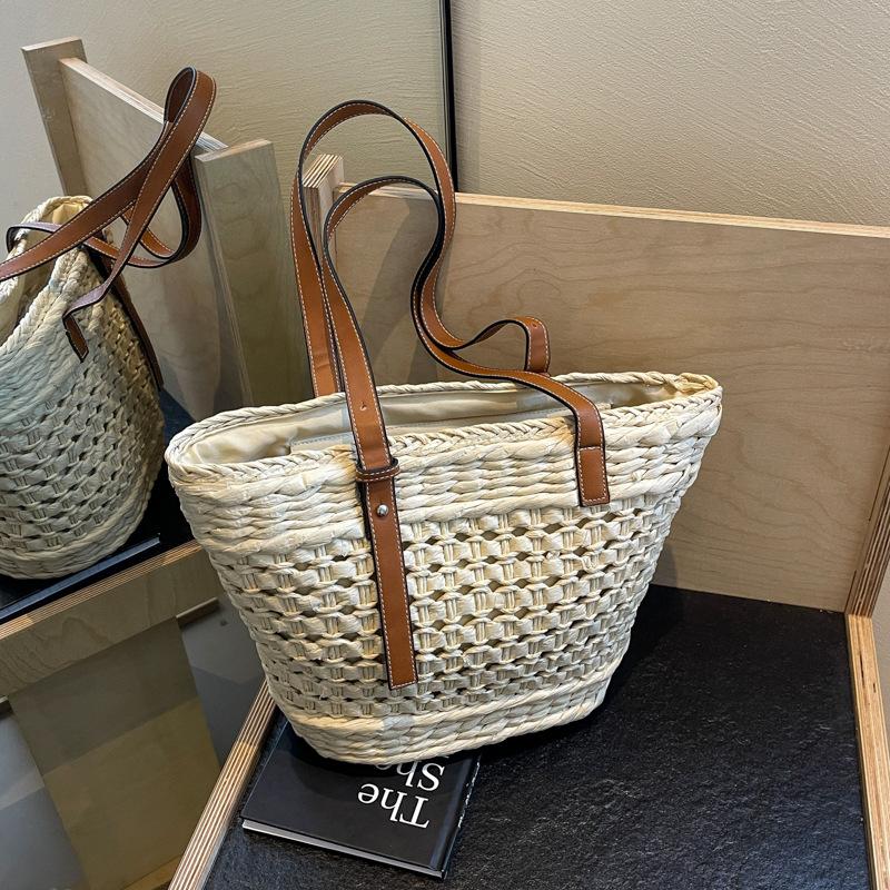 

Korean version handbag bag high-end sense large-capacity armpit bag 2025 spring new straw bag simple shoulder bag