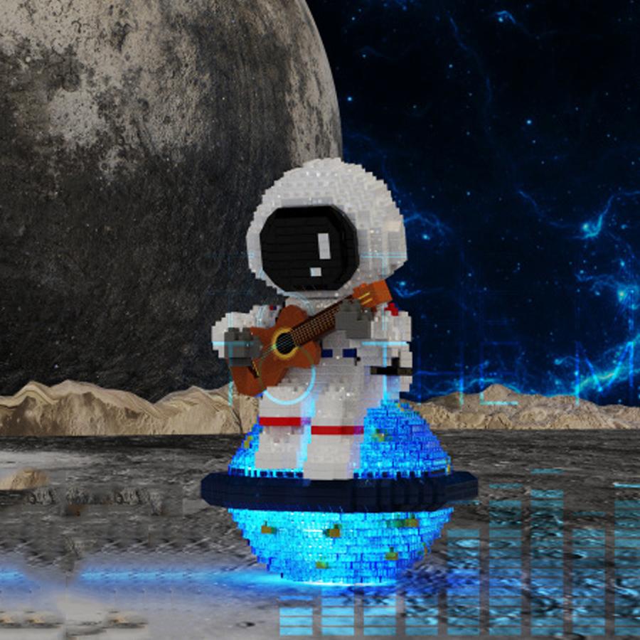 Non-Toxic 1423Pcs Guitar Astronaut Model Micro Building Blocks Luminous Spaceman Desktop Ornament For Kids Toys Gift Set