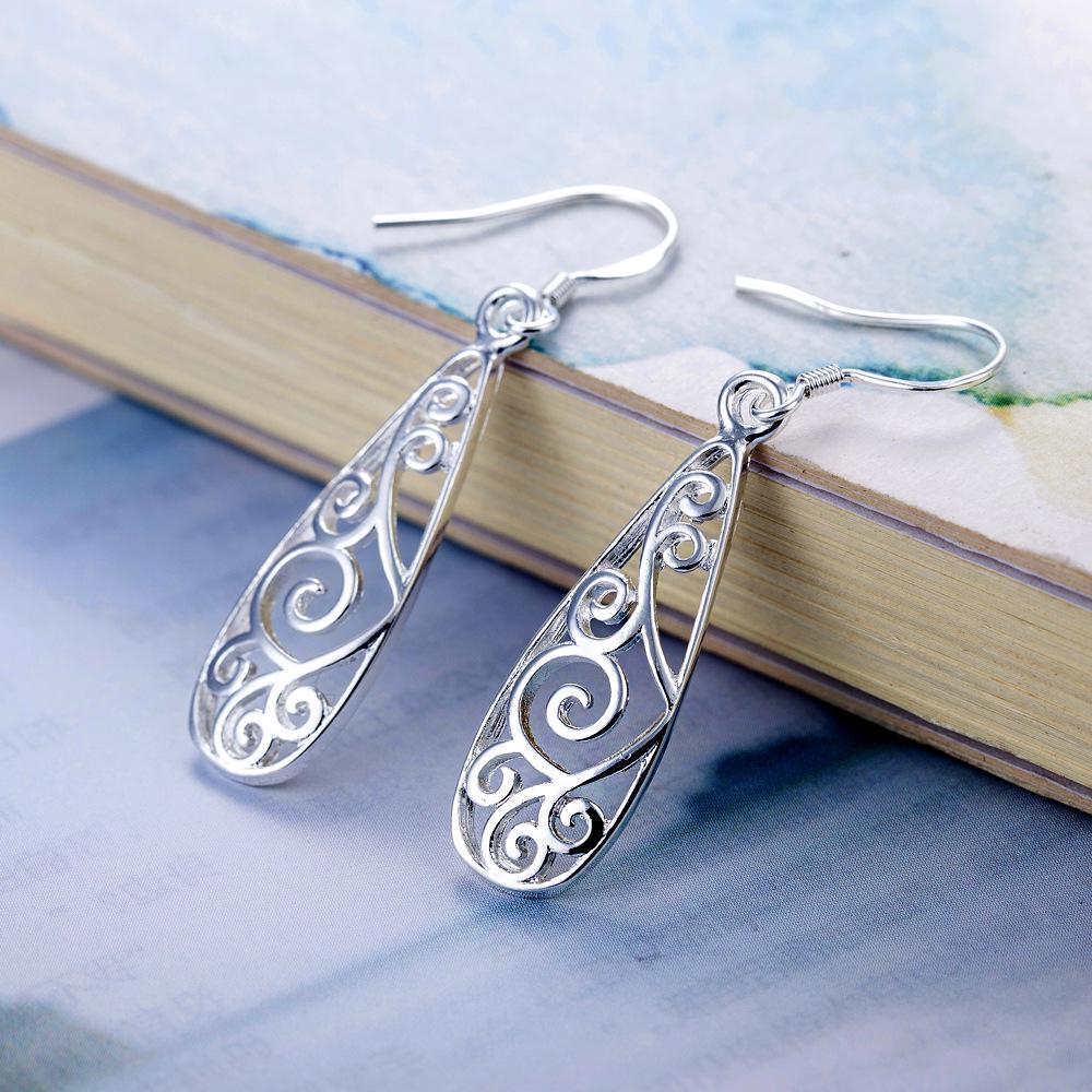 Silver-Plated Water-Drop Retro Hollow Earrings: Trendy and High-End Fashion for Europe and America