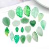 Set of 20 Green Transparent Faux Glass Leaf Pendants for DIY Bracelets, Necklaces, and Video Accessories.