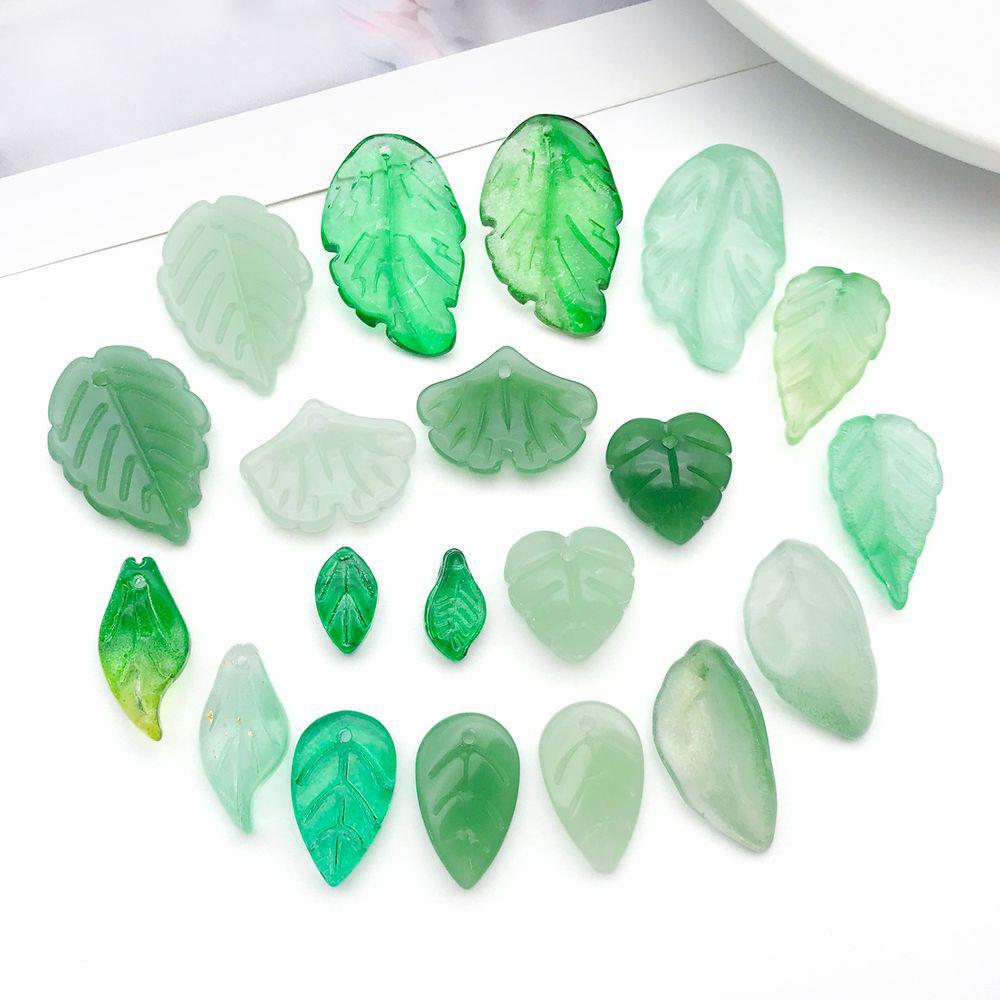 Set of 20 Green Transparent Faux Glass Leaf Pendants for DIY Bracelets, Necklaces, and Video Accessories.