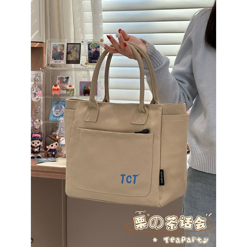 

Japanese Style Ins Art Casual Versatile Canvas Bag Female Large Capacity Tote Students Class Commuter Tote Khaki