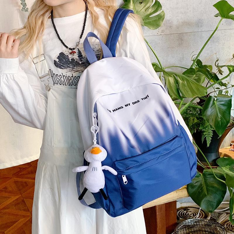 Graffiti Gradient Personality Schoolbag College Students' Backpacks for Boys and Girls' Travel Schoolbags Are Light and Large Capacity Backpacks.