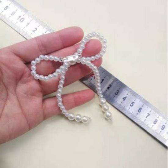 

Pearl Bow Brooch - Versatile Corsage Ornament for Sweaters, Evening Dresses, and Coats