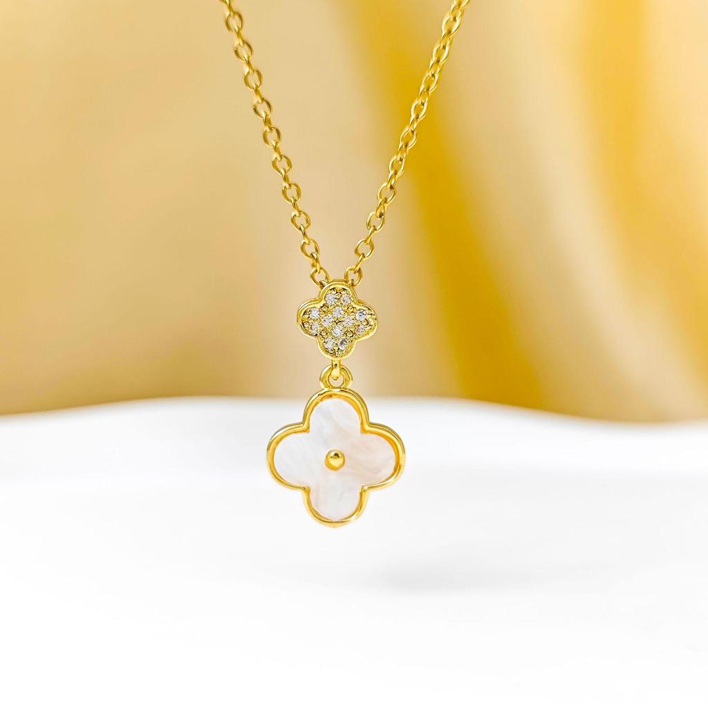 Stylish Korean Four-Leaf Clover Pendant with Micro-Inlaid Zircon and Tassel on a Titanium Steel Clavicle Chain