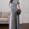 Round Neck Short-Sleeve Top & Pleated Long Skirt Set – Elegant & Slimming Style