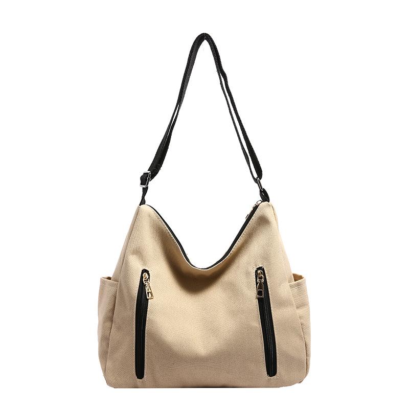 Neue einfarbige Damenhandtasche mit großem Fassungsvermögen, einfache lässige Tragetasche, trendige Mode, vielseitige Schulter-Umhängetasche