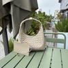 Hot-selling new high-texture cowhide hand-woven handbag large-capacity underarm bag versatile commuter women's bag