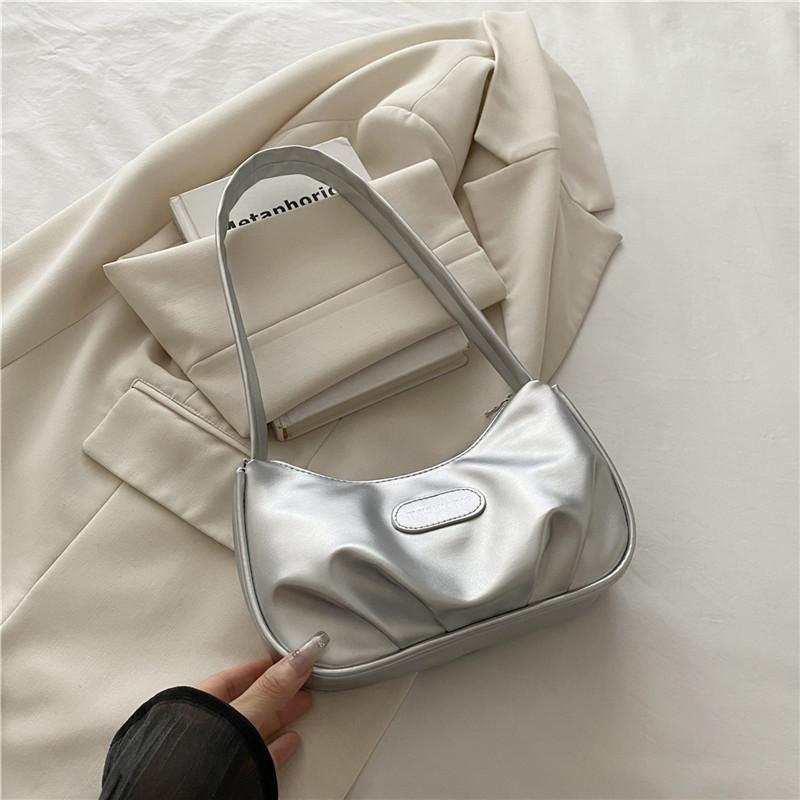 

2025 корейская версия сумки подмышку, плиссированная сумка, женская нишевая дизайнерская текстурная сумка на плечо, женский зарубежный стиль, личность, трендовый простой стиль серебряный