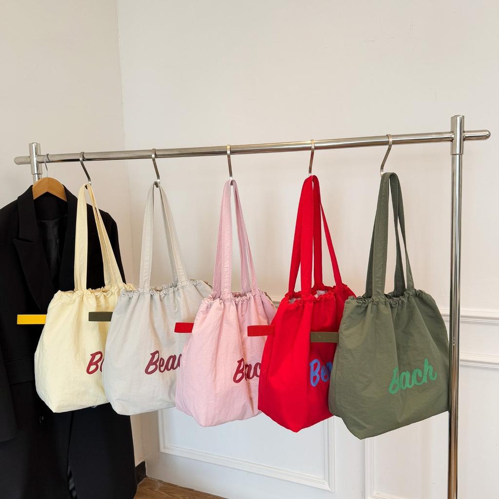Spring and summer new fashionable large-capacity shoulder underarm bag female simple commuter student tote bag