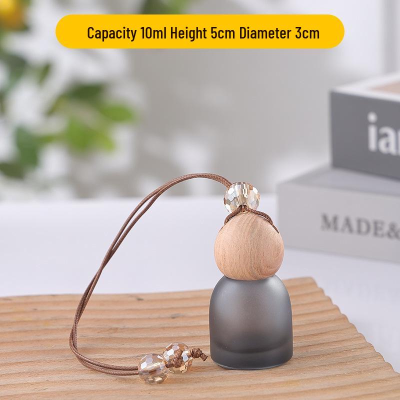 Frosted Glass Car Diffuser Bottle with Lanyard for Essential Oils - Refillable and Ideal for Home or Wardrobe Decor.
