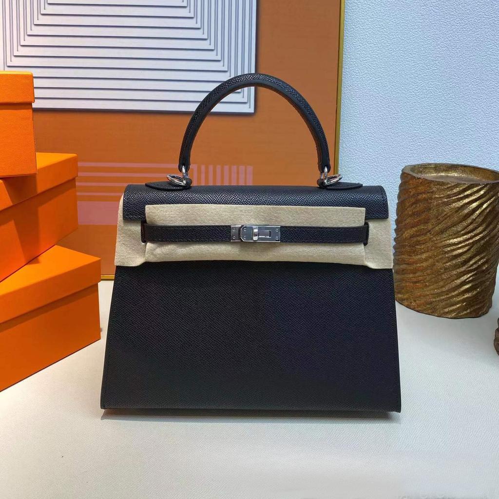 Grenzüberschreitende Hersteller Großhandel Damenhandtaschen 2023 neue Handtaschen aus Leder mit Palmenmuster tragbare Schulter-Umhängetaschen Damenhandtaschen große Kapazität