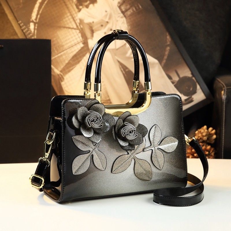 Univerzální dámská crossbody taška s květinami v temperamentu 2024 Nová elegantní kožená taška přes rameno