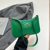 Fashion bow 2025 solid color new Korean version trendy texture foreign style commuting single shoulder underarm baguette bag women